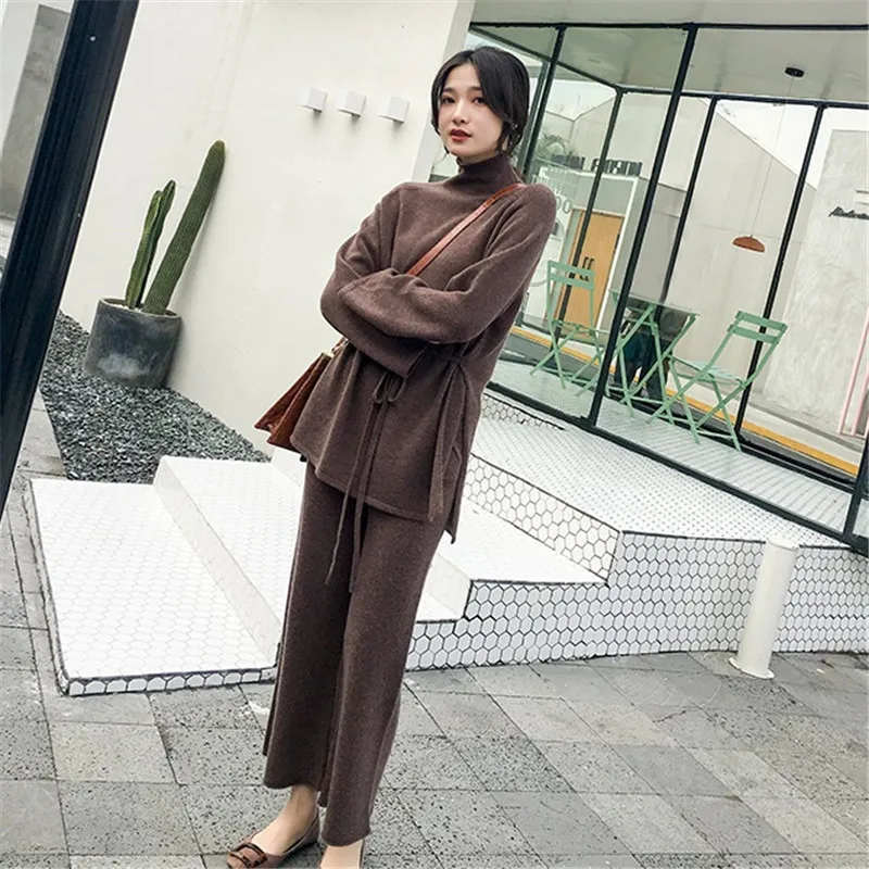 WomenTwo Piece Outfits for Women Turtleneck Long Sleeve Side Split Lace Up Knitted Sweater Wide Leg Pants Solid Suits
WomenTwo Piece Outfits for Women Turtleneck Long Sleeve Side Split Lace Up Knitted Sweater Wide Leg Pants Solid Suits