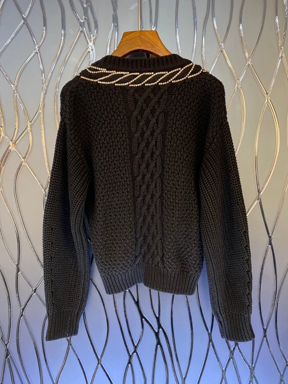 2020 autumn and winter new women's V-neck thick thread woven decorative buttons long-sleeved loose knit sweater 1113
2020 autumn and winter new women's V-neck thick thread woven decorative buttons long-sleeved loose knit sweater 1113