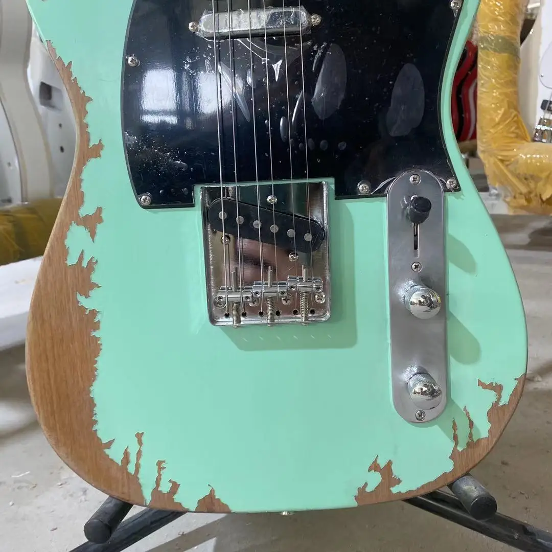 Tele Relic Electric Guitar Light Green Color Maple Fingerboard Black Pickguard Elder Body Free Shipping
Tele Relic Electric Guitar Light Green Color Maple Fingerboard Black Pickguard Elder Body Free Shipping