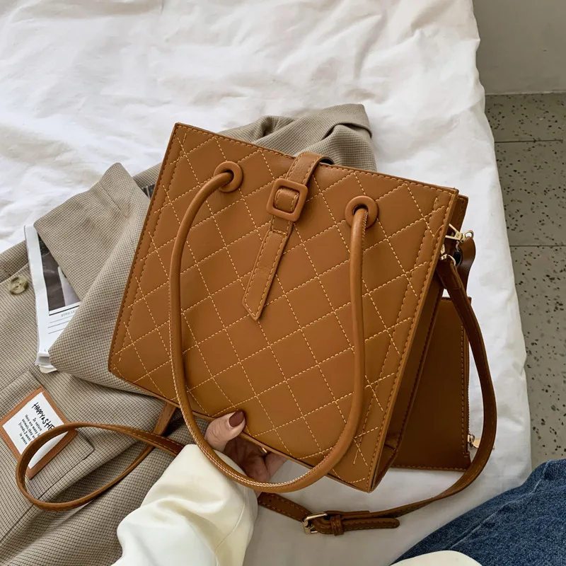 Autumn and winter bag women 2020new niche design large-capacity tote bag mother and bag fashion one-shoulder messenger bag
Autumn and winter bag women 2020new niche design large-capacity tote bag mother and bag fashion one-shoulder messenger bag