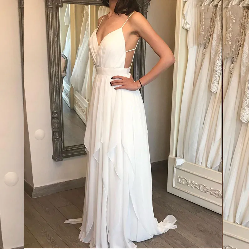 Sexy V-Neck Chiffon Wedding Dresses 2021 Spaghetti Court Train Sleeveless A-Line Backless Bride Robe De Mariée Custom Made
Sexy V-Neck Chiffon Wedding Dresses 2021 Spaghetti Court Train Sleeveless A-Line Backless Bride Robe De Mariée Custom Made