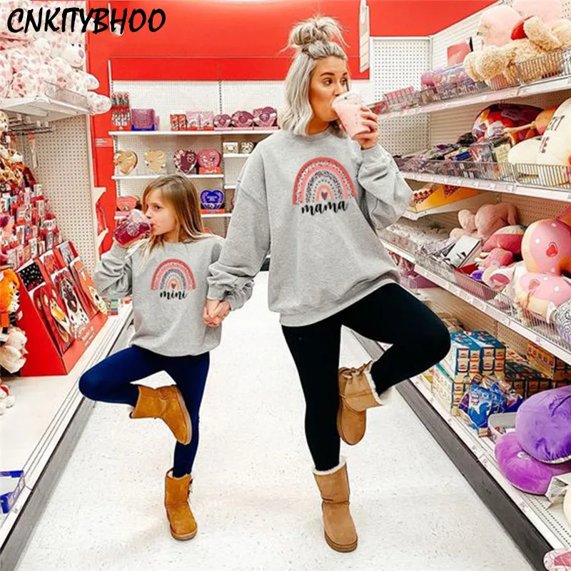Mother And Daughter Matchig Sweatshirts Autumn Winter “Mini Mama” Rainbow Print Pullovers Mommy And Me Clothes Family Look
Mother And Daughter Matchig Sweatshirts Autumn Winter “Mini Mama” Rainbow Print Pullovers Mommy And Me Clothes Family Look