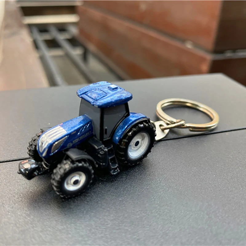 Модель металлического брелока Uh5814 в виде трактора New Holland T7.225 Коллекционная Подарочная демонстрация статическое украшение художественное ...
Модель металлического брелока Uh5814 в виде трактора New Holland T7.225 Коллекционная Подарочная демонстрация статическое украшение художественное ...