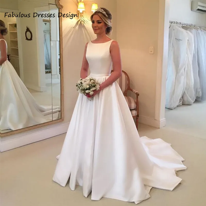 2021 White A Line Wedding Dresses Backless O Neck Bowknot Sweep Train Bridal Gowns Exquisite Plus Size Vestidos De Novia
2021 White A Line Wedding Dresses Backless O Neck Bowknot Sweep Train Bridal Gowns Exquisite Plus Size Vestidos De Novia