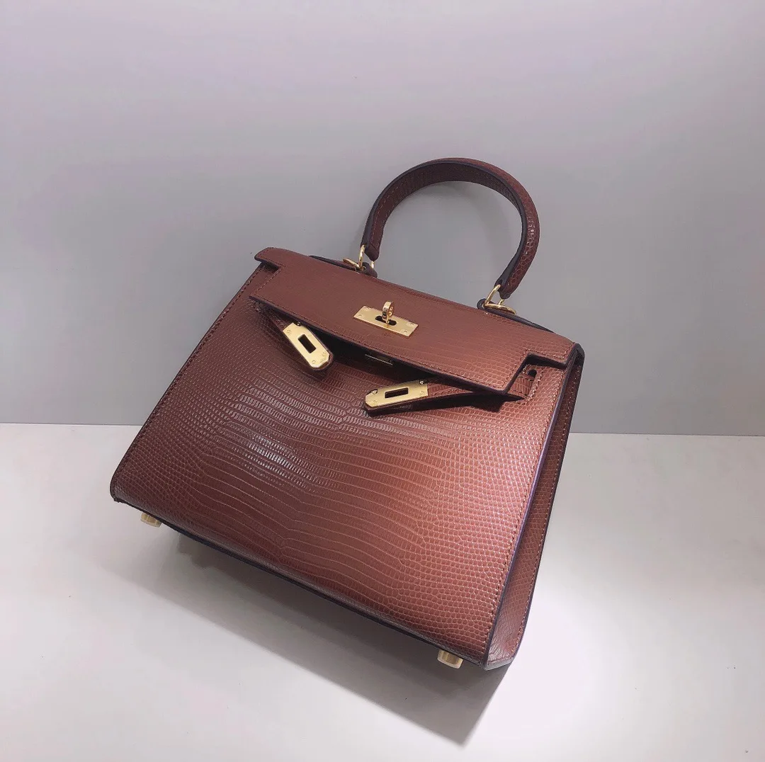 Genuine Cow Leather 2021 The New Style Fashion High Quality Women Top Handbag One Shoulder And Crossbody Bag 23cm 9Color
Genuine Cow Leather 2021 The New Style Fashion High Quality Women Top Handbag One Shoulder And Crossbody Bag 23cm 9Color