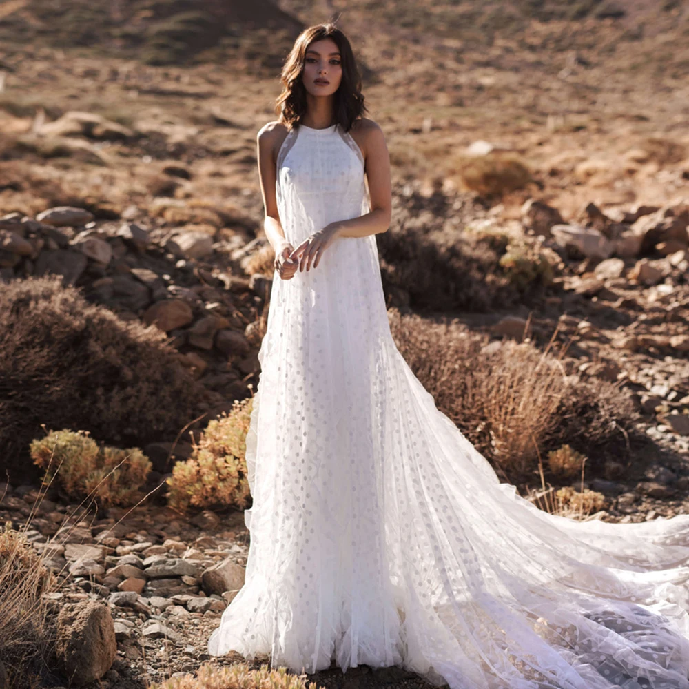 2021 Boho Wedding Dresses Spot Tulle Illusion Princess Beach Mermaid Bridal Gowns Simple Sweep Train Custom Made robe de mariée
2021 Boho Wedding Dresses Spot Tulle Illusion Princess Beach Mermaid Bridal Gowns Simple Sweep Train Custom Made robe de mariée