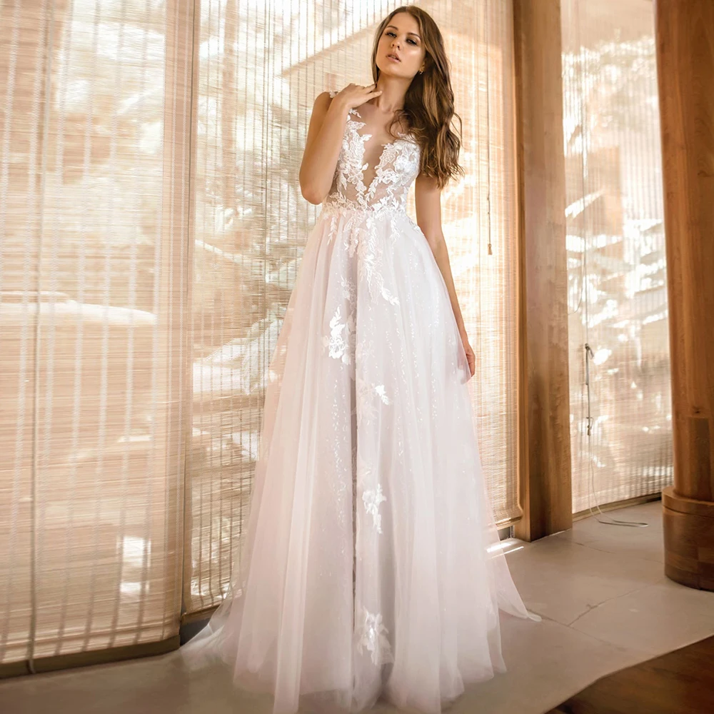 Charming Sleeveless Wedding Dress A-Line V-Neck Tulle Buttons Lace Applique Sweep Train Bridal Gowns 2021 Vestido De Noiva
Charming Sleeveless Wedding Dress A-Line V-Neck Tulle Buttons Lace Applique Sweep Train Bridal Gowns 2021 Vestido De Noiva