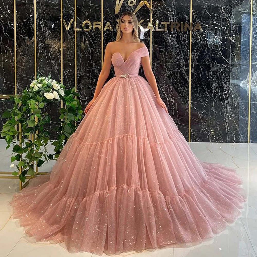 

Ball Gown Blush Pink Evening Dresses Glitter Tiered Tulle One Shoulder Puffy Prom Party Gowns with Beaded Sash