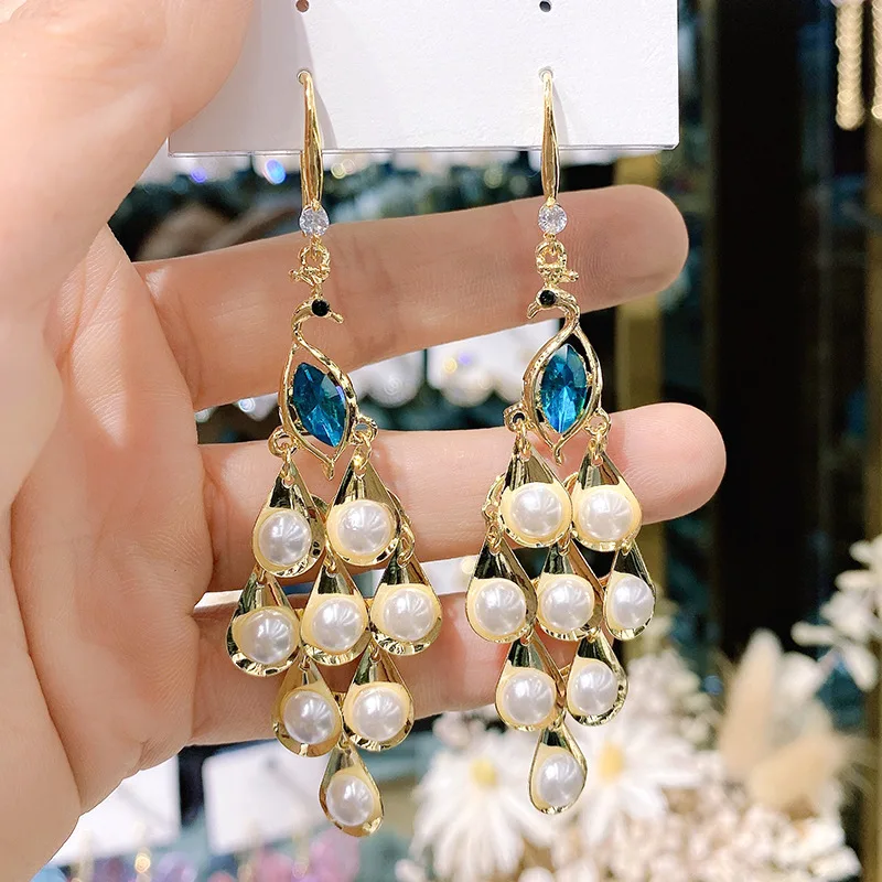 Fashion Jewelry 925 Silver AAA + Zircon Crystal Peacock Pearl Tassel Earrings Womans Girl French Pendants Earrings
Fashion Jewelry 925 Silver AAA + Zircon Crystal Peacock Pearl Tassel Earrings Womans Girl French Pendants Earrings