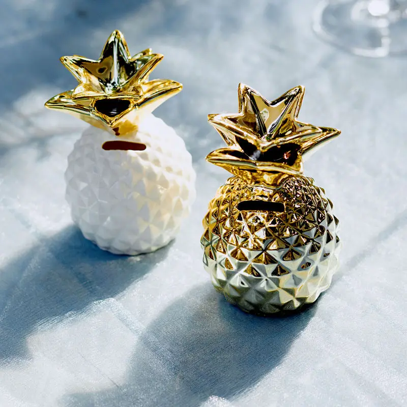 New electroplated gold pineapple piggy bank ceramic home decoration white pineapple piggy bank export
New electroplated gold pineapple piggy bank ceramic home decoration white pineapple piggy bank export