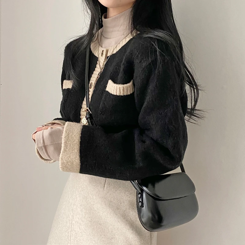 2021 Spring Retro Women O-Neck Sweaters Chic Knitted Female Loose Solid Elegant Cardigans Office Lady Casual Tops
2021 Spring Retro Women O-Neck Sweaters Chic Knitted Female Loose Solid Elegant Cardigans Office Lady Casual Tops