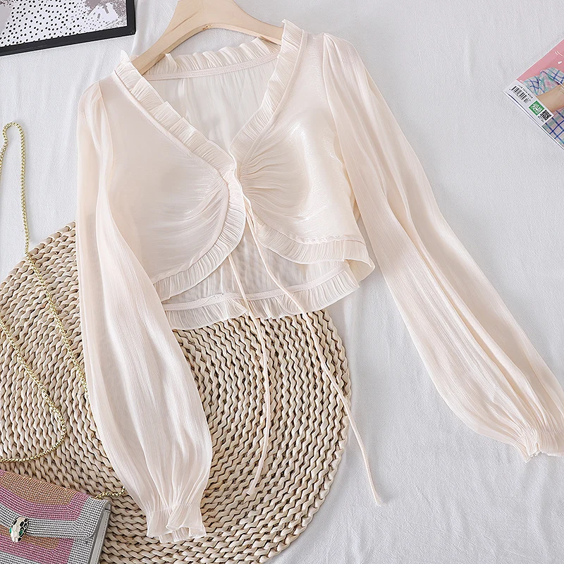 Spring and summer new French retro satin lace-up sunscreen cardigan top, small shirt short coat, outer wear niche
Spring and summer new French retro satin lace-up sunscreen cardigan top, small shirt short coat, outer wear niche