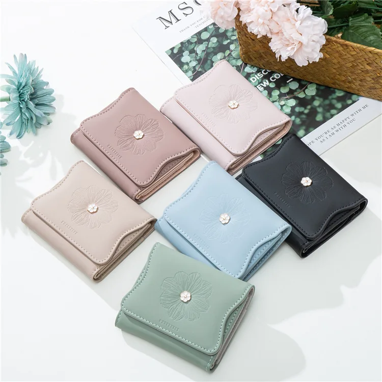 Simple large-capacity multi-function small fresh embossed ladies wallet tri-fold short wallet
Simple large-capacity multi-function small fresh embossed ladies wallet tri-fold short wallet