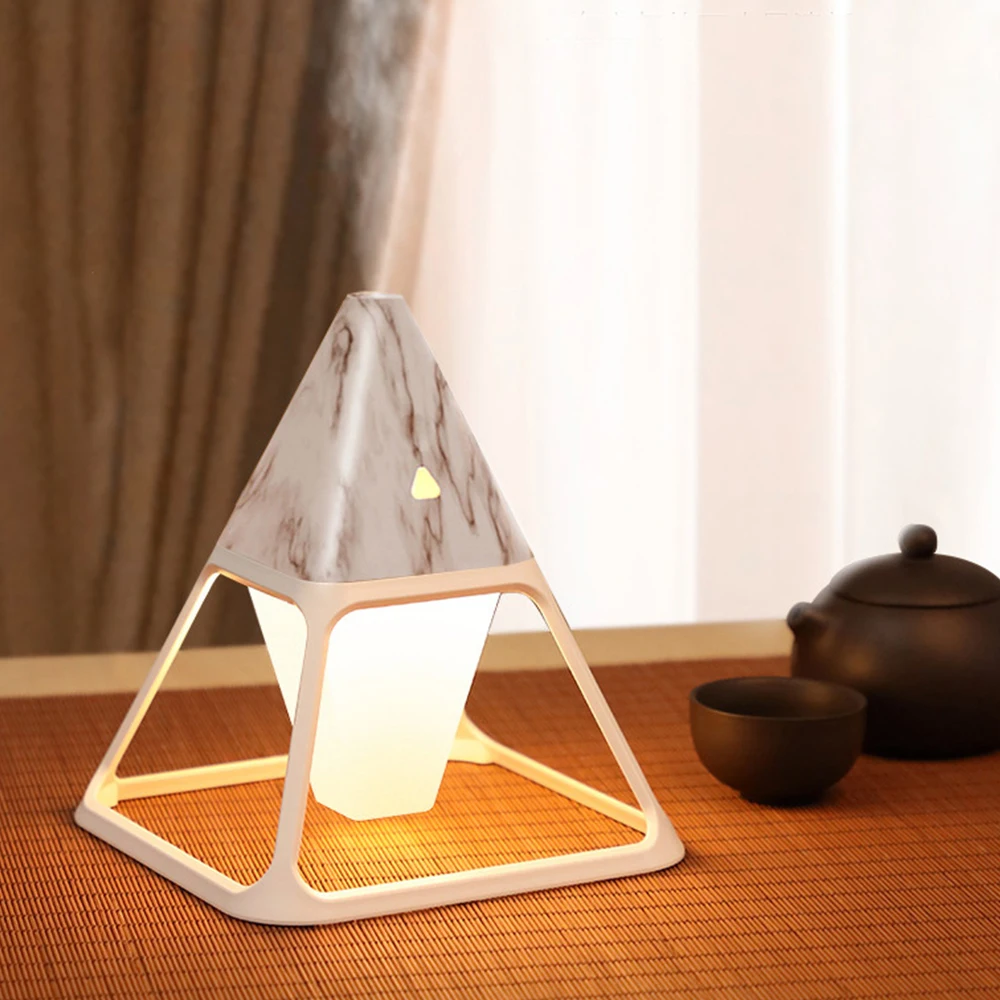 Creative pyramid mini humidifier usb night light home desktop with remote control adjustment
Creative pyramid mini humidifier usb night light home desktop with remote control adjustment