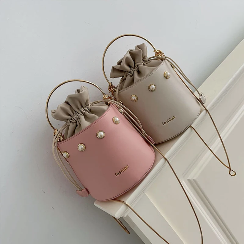2021 new fashion western style all-match pearl bucket bag ins mini portable chain shoulder messenger bag
2021 new fashion western style all-match pearl bucket bag ins mini portable chain shoulder messenger bag