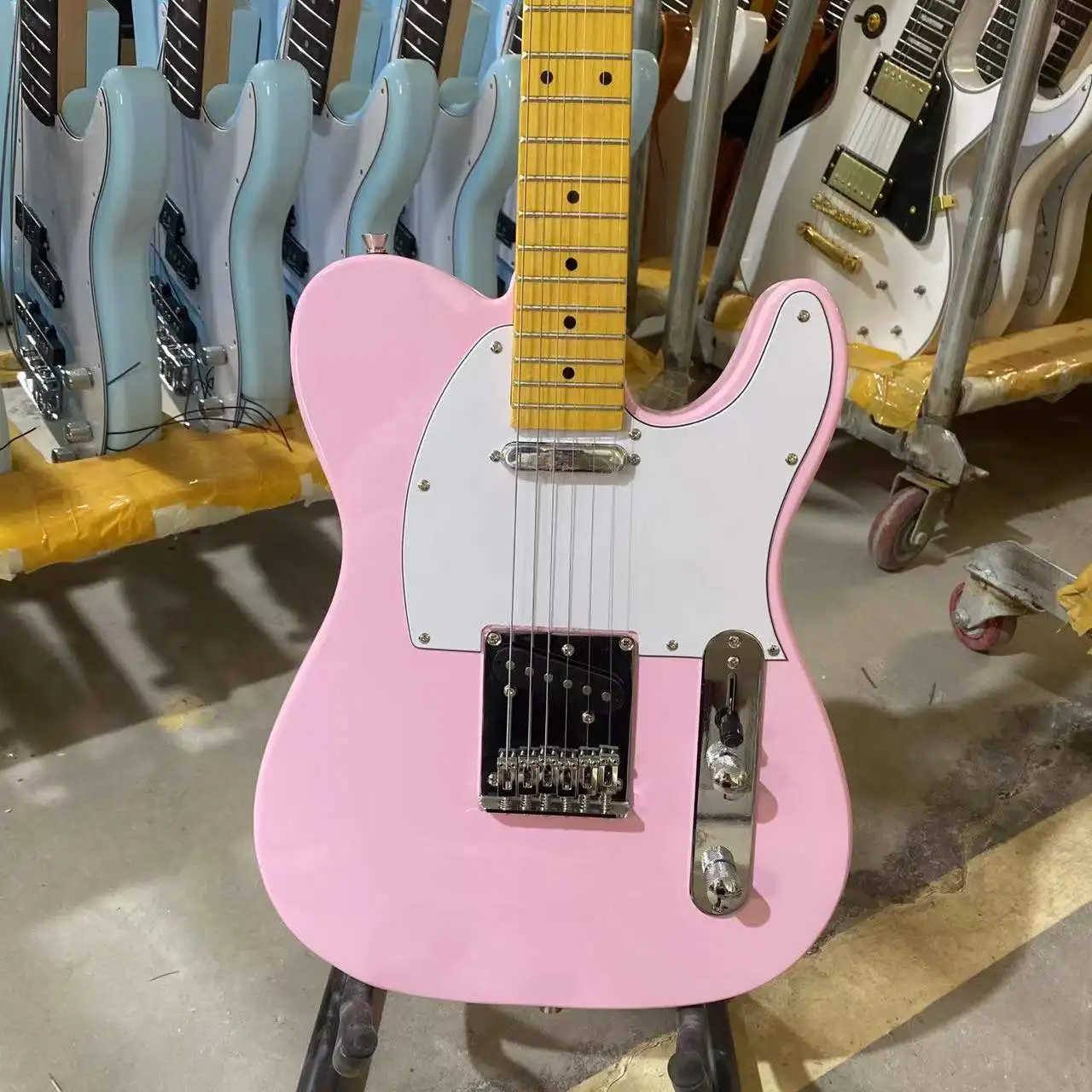 Tele Electric Guitar Version Pink Color Maple Fingerboard Chrome Hardware High Quality Guitarar Free Shipping
Tele Electric Guitar Version Pink Color Maple Fingerboard Chrome Hardware High Quality Guitarar Free Shipping