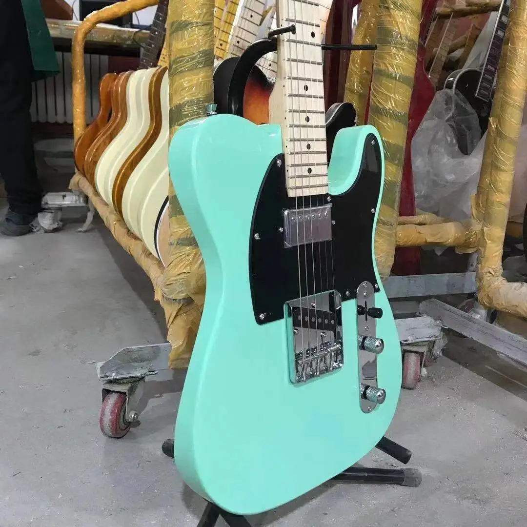 tele guitar surf green color black pickguard maple fingerboard tele electric guitar free shipping
tele guitar surf green color black pickguard maple fingerboard tele electric guitar free shipping