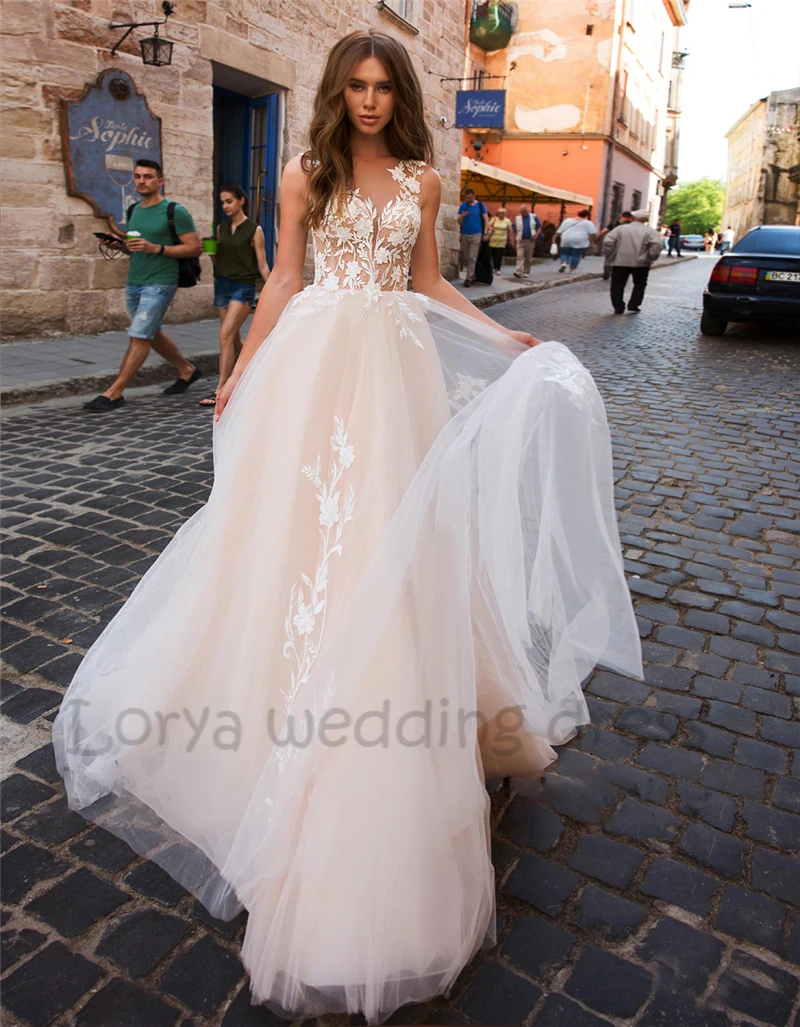 Bohemia A Line Wedding Dress V Neck Sleeveless Backless Lace Appliques Vestido De Novia Sweep Train Bride GownRobe de Mariée
Bohemia A Line Wedding Dress V Neck Sleeveless Backless Lace Appliques Vestido De Novia Sweep Train Bride GownRobe de Mariée