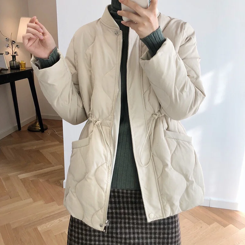 Stand-up collar down padded jacket women's mid-length 2020 winter new waist rhombic padded jacket thickened warmth
Stand-up collar down padded jacket women's mid-length 2020 winter new waist rhombic padded jacket thickened warmth
