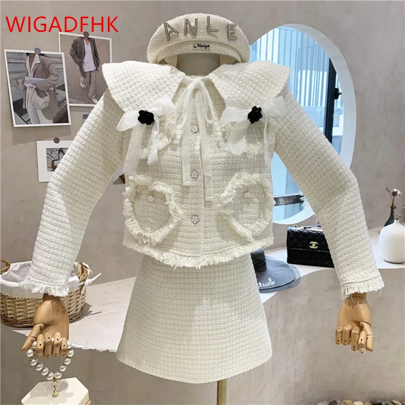 Sweet Little Fragrant Tweed Suit Female Bow Tie Doll Collar Tweed Short Coat High Waist Skirt Fashion Two-piece Suit
Sweet Little Fragrant Tweed Suit Female Bow Tie Doll Collar Tweed Short Coat High Waist Skirt Fashion Two-piece Suit