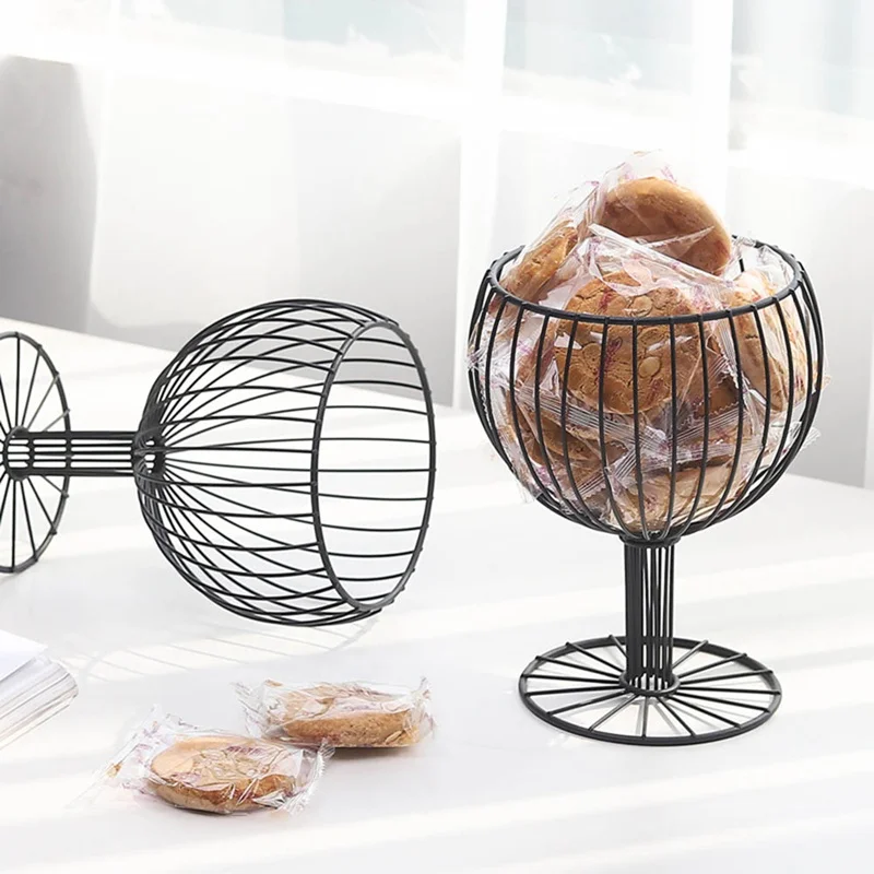 Hollow Iron Wine Glass Shape Fruit Basket Simple Household Living Room Snacks Tray Art Candy Dessert Kitchen Storage Basket
Hollow Iron Wine Glass Shape Fruit Basket Simple Household Living Room Snacks Tray Art Candy Dessert Kitchen Storage Basket