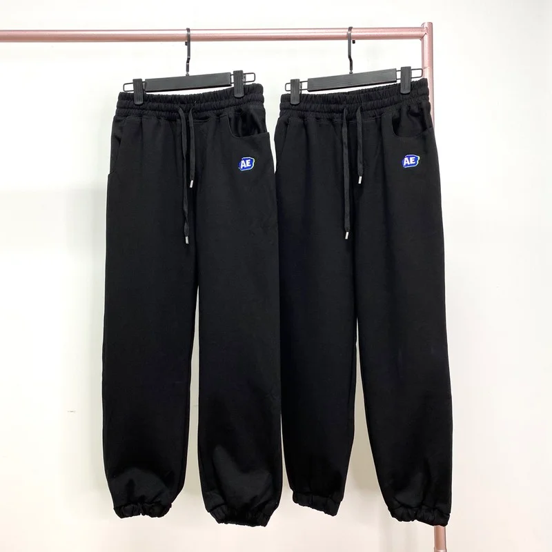 New ADER Sweatpants Women Men Embroidered Logo Irregular Pants Fashion Trendy Brand Guard Loose Harajuku Sweatpants
New ADER Sweatpants Women Men Embroidered Logo Irregular Pants Fashion Trendy Brand Guard Loose Harajuku Sweatpants