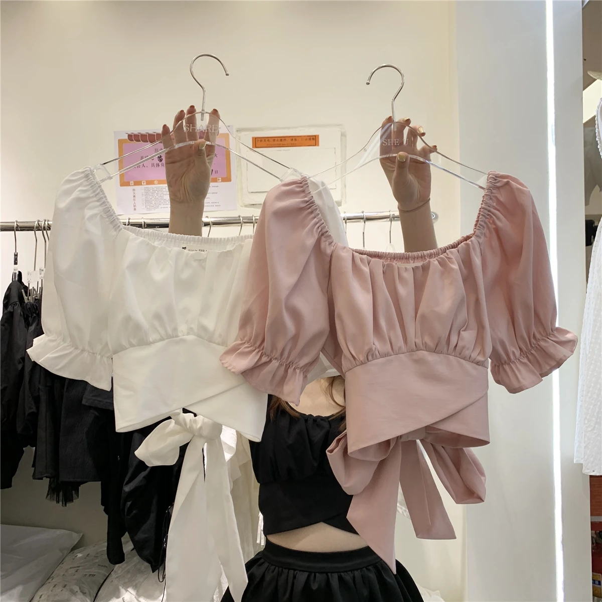 Korea summer design feeling small bowknot lace-up shirt female backless all show thin short jacket
Korea summer design feeling small bowknot lace-up shirt female backless all show thin short jacket