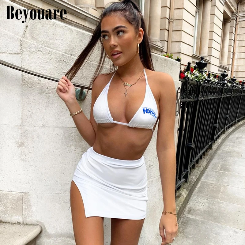 Beyouare Sexy Beach Style Letter Print Women Skirt Two Piece Set Halter Bandage Crop Top And Split Skirt 2021 Summer Casual Suit
Beyouare Sexy Beach Style Letter Print Women Skirt Two Piece Set Halter Bandage Crop Top And Split Skirt 2021 Summer Casual Suit