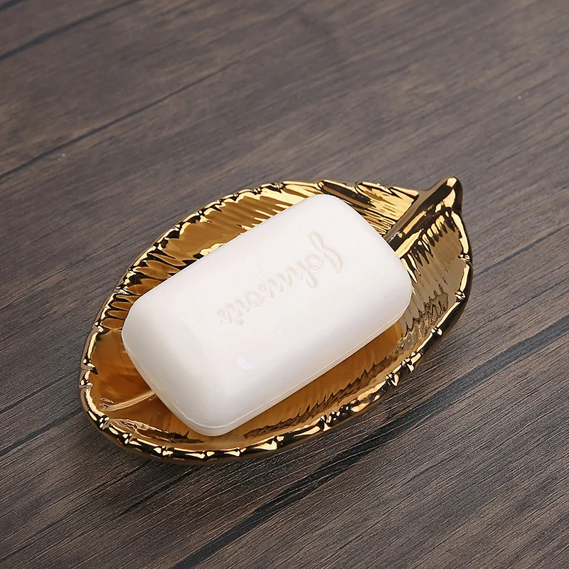 1Pcs Creative leaf soap dish Portable Ceramic Soap box Jewelry watch storage rack Home Hotel Soap Holder Bathroom Accessories
1Pcs Creative leaf soap dish Portable Ceramic Soap box Jewelry watch storage rack Home Hotel Soap Holder Bathroom Accessories