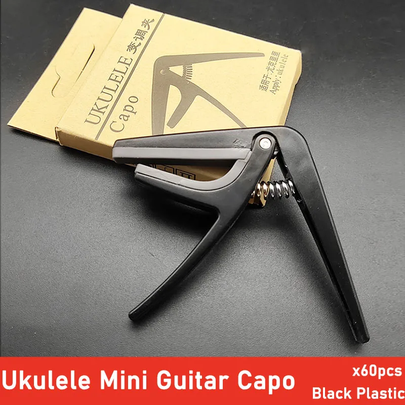 60pcs Professional Ukulele Guitar Capo 4 String Hawaii Mini Guitarra Capos Guitar Parts Black Plastic
60pcs Professional Ukulele Guitar Capo 4 String Hawaii Mini Guitarra Capos Guitar Parts Black Plastic