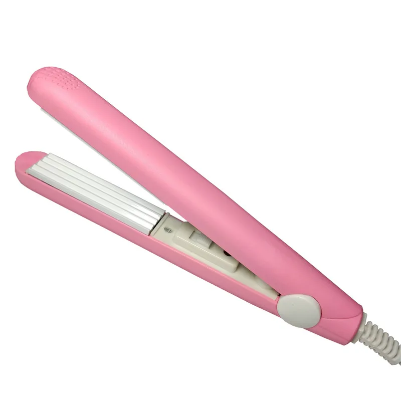 A mini hair iron pink corrugated plate electric curling iron curl modelling tools
A mini hair iron pink corrugated plate electric curling iron curl modelling tools