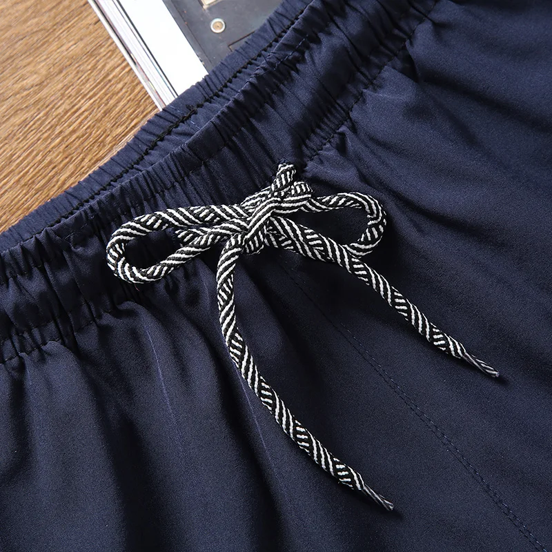 Men's five-point pants trend loose casual shorts beach pants men's summer sports pants Korean style popular solid color shorts
Men's five-point pants trend loose casual shorts beach pants men's summer sports pants Korean style popular solid color shorts