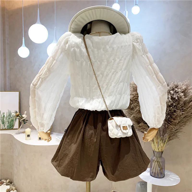 Two piece set Women's Clothing Summer 2021 Fashion Temperament V-neck pleated long sleeve pleated Top + high waist shorts Pants
Two piece set Women's Clothing Summer 2021 Fashion Temperament V-neck pleated long sleeve pleated Top + high waist shorts Pants