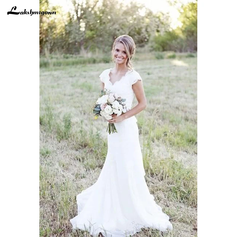 Vintage Lace V Neck Mermaid Wedding Dresses Cap Sleeve Modest Country Bridal Gowns Boho Beach Covered Button Wedding Gowns
Vintage Lace V Neck Mermaid Wedding Dresses Cap Sleeve Modest Country Bridal Gowns Boho Beach Covered Button Wedding Gowns