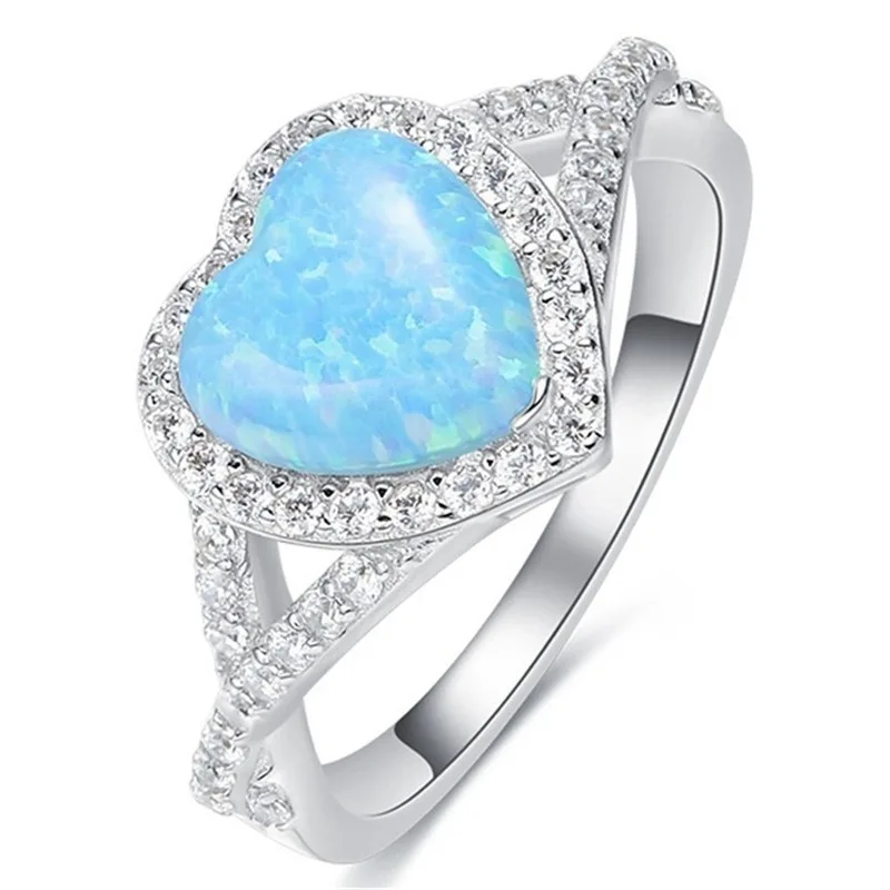 New Heart-shaped Cross Blue Opal Ladies Ring Personality Creative Banquet Ring Trend Party Ring Holiday Gift Ring
New Heart-shaped Cross Blue Opal Ladies Ring Personality Creative Banquet Ring Trend Party Ring Holiday Gift Ring