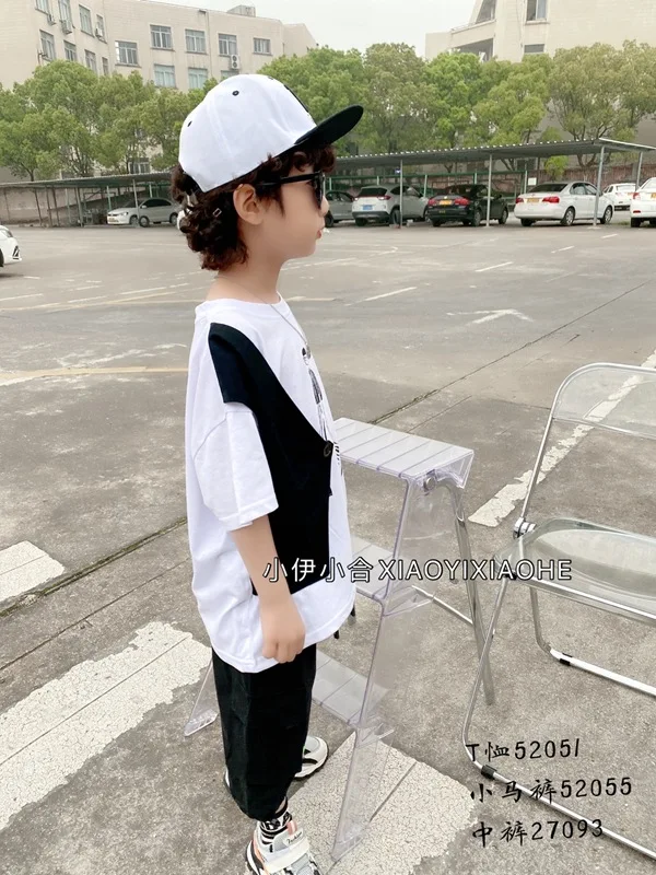 2021 personality stitching fake two-piece short-sleeved T-shirt children's summer mid-length cartoon print half-sleeved top
2021 personality stitching fake two-piece short-sleeved T-shirt children's summer mid-length cartoon print half-sleeved top