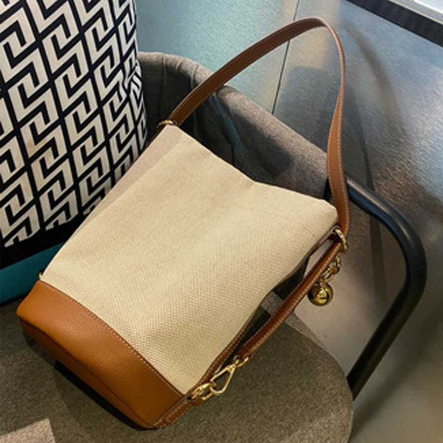 Casual Canvas Bucket Bags Women Bell Shoulder Bags Cowhide Stitching Canvas Handbag Fashion Large Capacity Female Tote Bag 2021
Casual Canvas Bucket Bags Women Bell Shoulder Bags Cowhide Stitching Canvas Handbag Fashion Large Capacity Female Tote Bag 2021