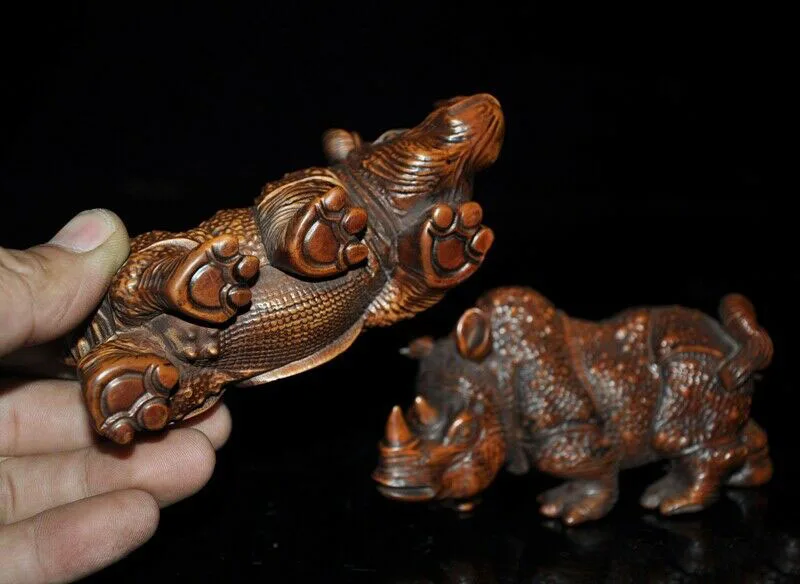 wedding decoration Antique Fengshui Chinese Boxwood hand carved animal rhinoceros Rhino statue pair
wedding decoration Antique Fengshui Chinese Boxwood hand carved animal rhinoceros Rhino statue pair