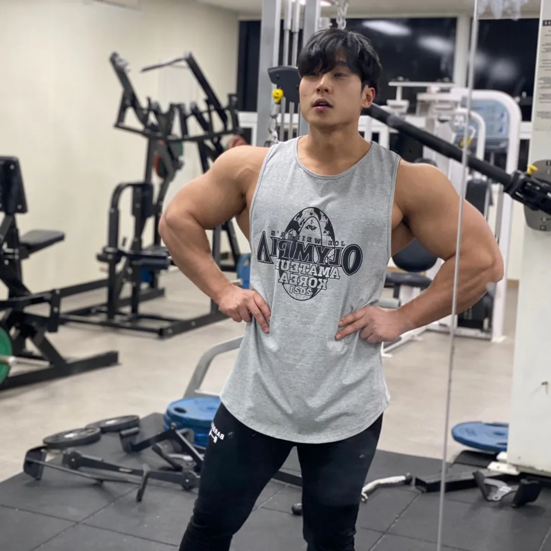 2021 New Mens pure color Wide shoulder Sleeveless Tank Tops Summer Print Cotton Male gyms Bodybuilding Fitness tank top Clothing 
2021 New Mens pure color Wide shoulder Sleeveless Tank Tops Summer Print Cotton Male gyms Bodybuilding Fitness tank top Clothing