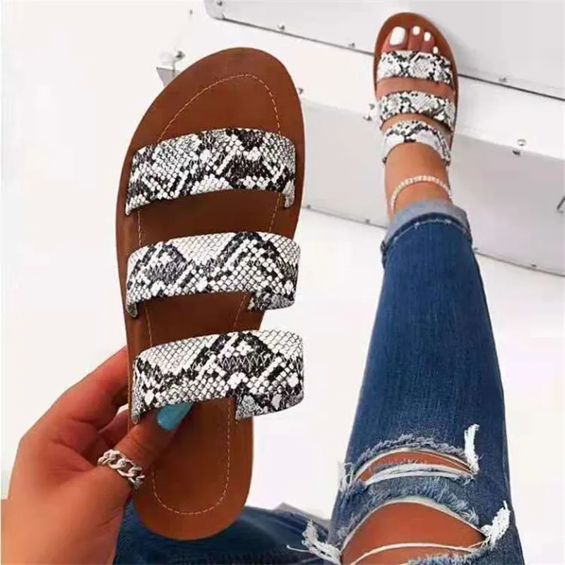 2021 European and American Ladies Large Size Flat Open Toe Hollow Snake Print Slippers 1843
2021 European and American Ladies Large Size Flat Open Toe Hollow Snake Print Slippers 1843