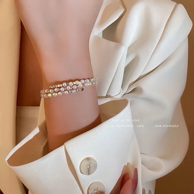 Double pearl set diamond bracelet with personality opening bracelet ultra light luxury handdress
Double pearl set diamond bracelet with personality opening bracelet ultra light luxury handdress