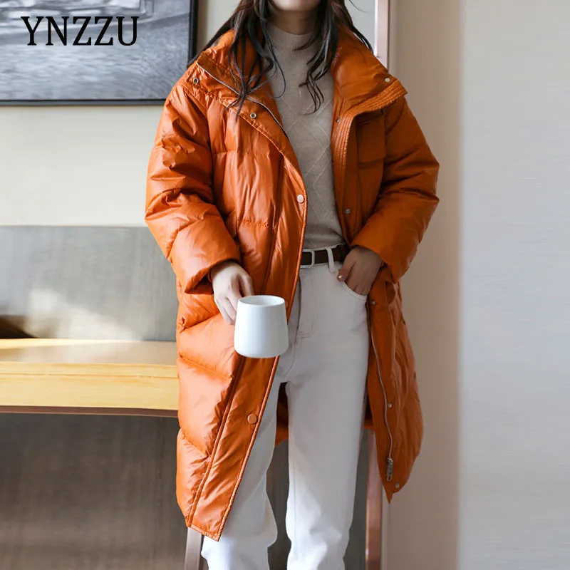 Casual Women Winter Long down jacket 2021 Solid Stand collar Female white duck down coat Loose Pocket parka Elegant YNZZU 1O087 
Casual Women Winter Long down jacket 2021 Solid Stand collar Female white duck down coat Loose Pocket parka Elegant YNZZU 1O087