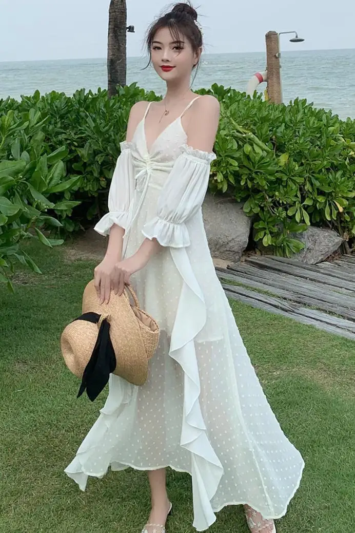Balinese Beach Resort skirt women's summer white super fairy Thai Ruffle suspender dress open back dress
Balinese Beach Resort skirt women's summer white super fairy Thai Ruffle suspender dress open back dress