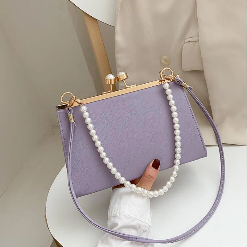 Luxury Pearl Handle Handbags and Purses Fashion Flap Shoulder Bags for Women Solid Simple Crossbody Bags Lady Small Tote
Luxury Pearl Handle Handbags and Purses Fashion Flap Shoulder Bags for Women Solid Simple Crossbody Bags Lady Small Tote