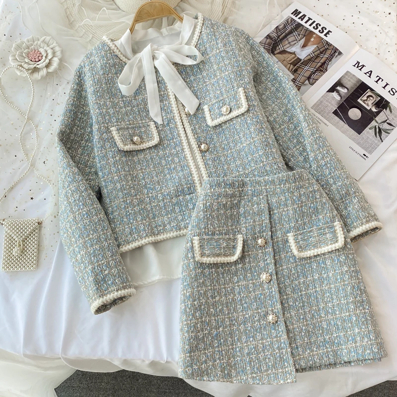Ladies tweed jacket three-piece suit bow tie tie shirt irregular hip skirt skirt women
Ladies tweed jacket three-piece suit bow tie tie shirt irregular hip skirt skirt women