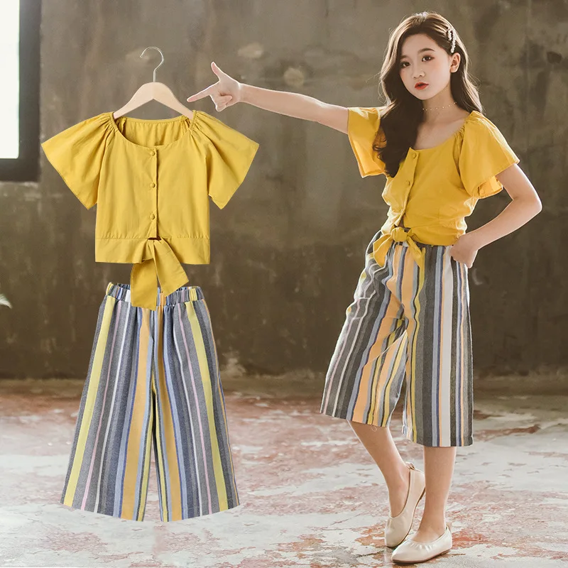 Fashion Summer Girls Clothing Set Children Short Sleeve Shirts + Striped Wide Leg Pants 2 Piece Baby Girl Outfit Teenage Clothes
Fashion Summer Girls Clothing Set Children Short Sleeve Shirts + Striped Wide Leg Pants 2 Piece Baby Girl Outfit Teenage Clothes