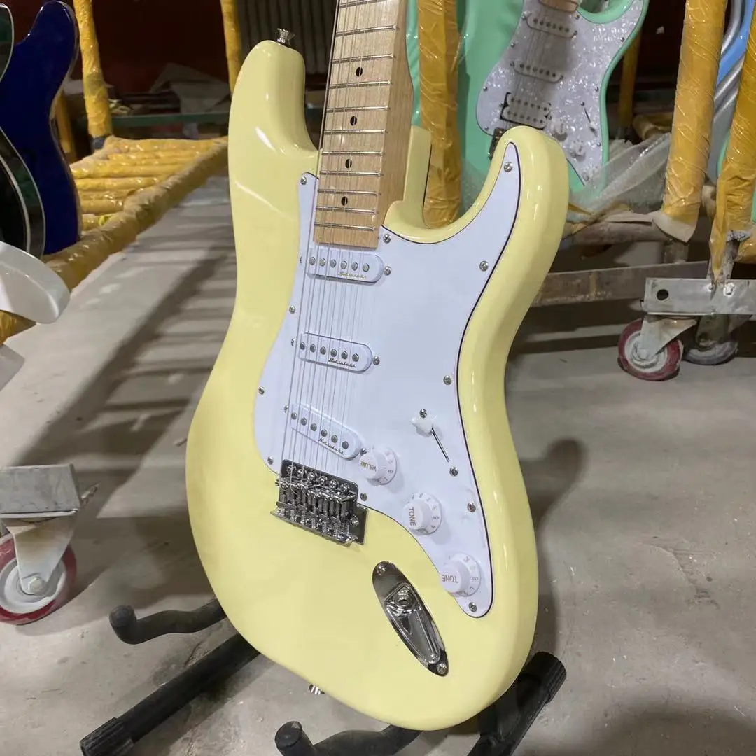 ST Electric Guitar Cream Yellow Color Maple Fingerboard White Pickguard Free Shipping 
ST Electric Guitar Cream Yellow Color Maple Fingerboard White Pickguard Free Shipping