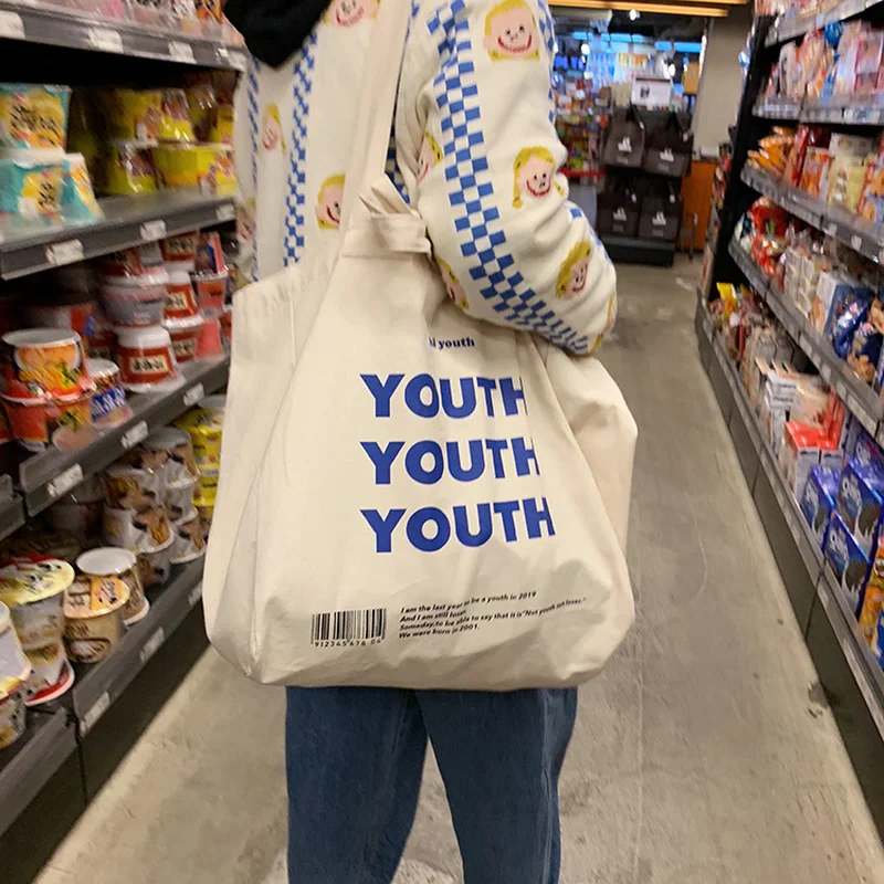 Women Canvas Shopping Bag YOUTH Letters Print Female Cotton Cloth Shoulder Bag Eco Handbag Tote Reusable Grocery Shopper Bags
Women Canvas Shopping Bag YOUTH Letters Print Female Cotton Cloth Shoulder Bag Eco Handbag Tote Reusable Grocery Shopper Bags