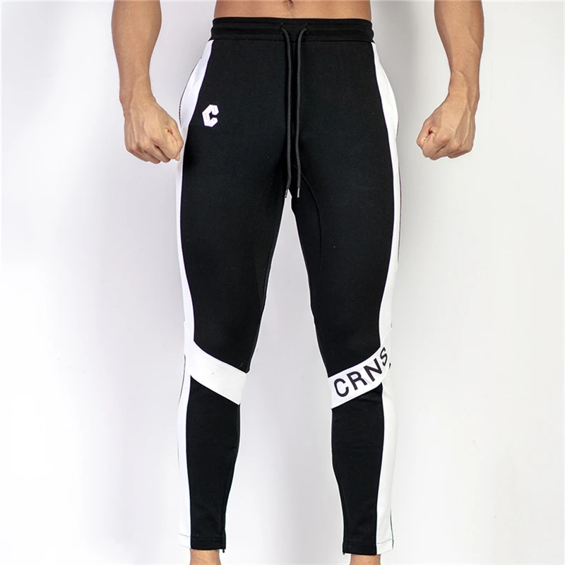 Casual Sports Pants Mens Jogger Sweatpants Gyms Fitness Workout Brand Trousers Male Autumn Fashion Cotton Sportswear Track Pants
Casual Sports Pants Mens Jogger Sweatpants Gyms Fitness Workout Brand Trousers Male Autumn Fashion Cotton Sportswear Track Pants