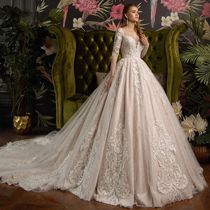 Luxury Wedding Dresses Long Sleeve O Neck Lace Applique Glamorous Gowns Shiny Tulle Pearl Robe de mariée Court Train Tailor-Made
Luxury Wedding Dresses Long Sleeve O Neck Lace Applique Glamorous Gowns Shiny Tulle Pearl Robe de mariée Court Train Tailor-Made